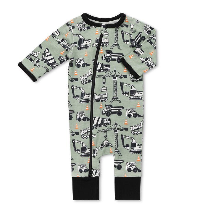 Baby onesie with construction vehicle pattern on a light green background