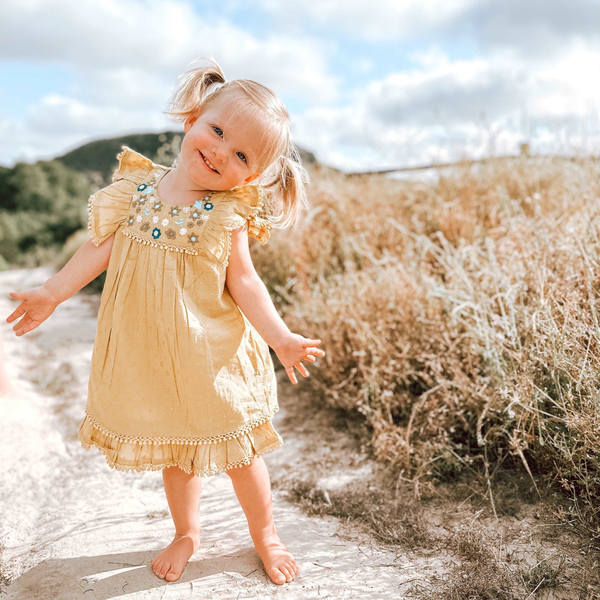 arya mini dress in mustard