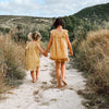 arya mini dress in mustard