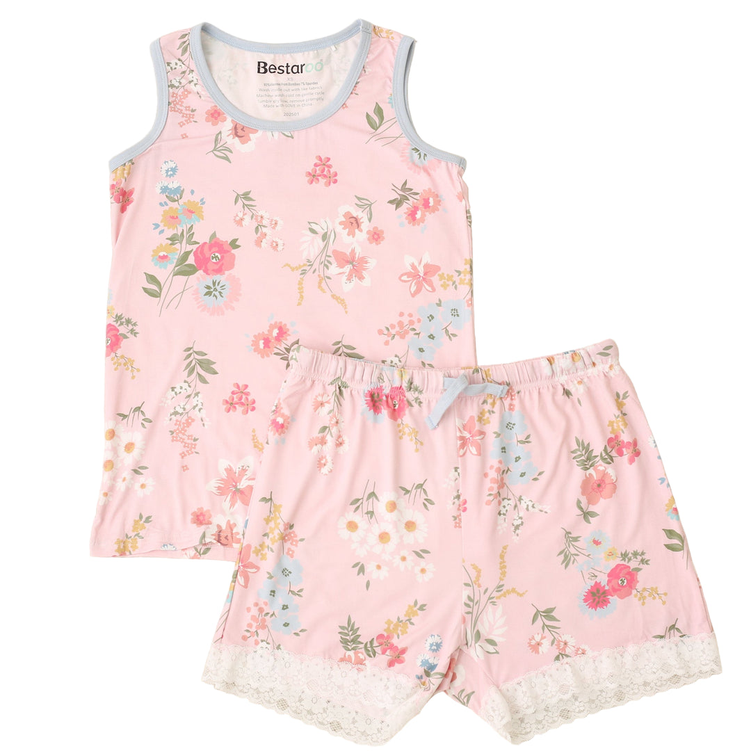 Floral pajama set with shorts on a beige carpet