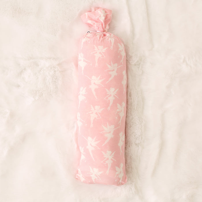 Pink floral-patterned bottle cover on a light beige background