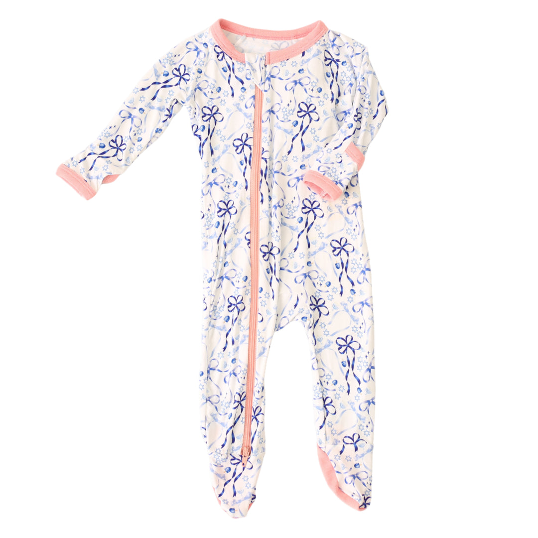 Floral-patterned baby onesie with pink accents on a white background