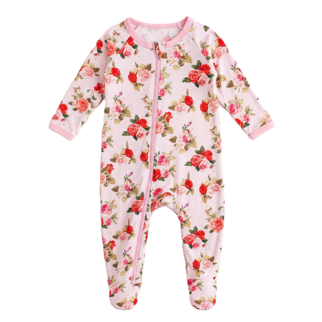 Floral-patterned baby onesie on a white background
