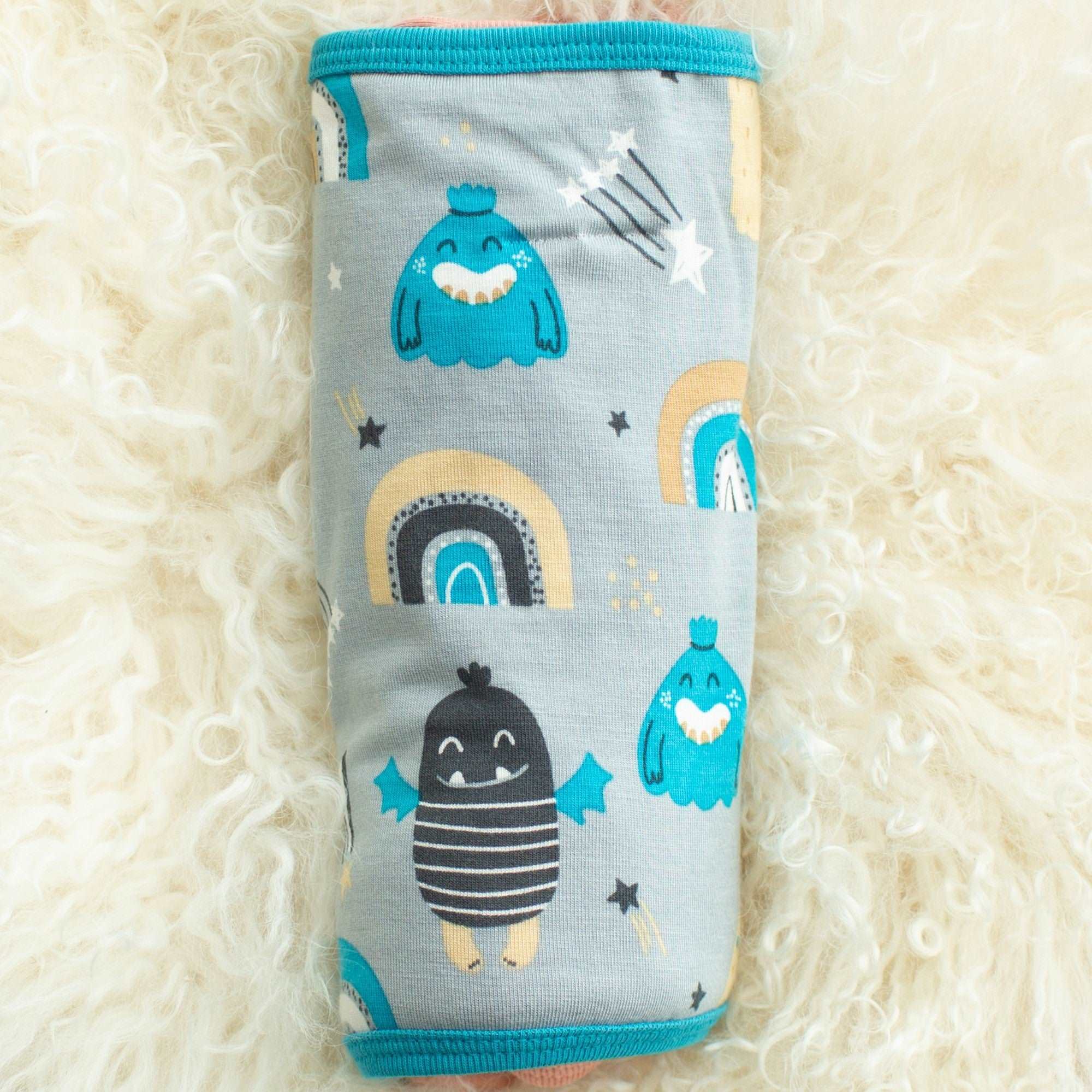 Blue Happy Monsters Swaddle