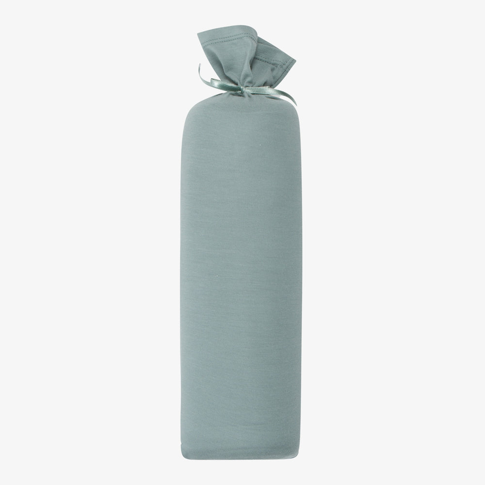A rolled-up slate blue swaddle blanket with a tie at one end, displayed against a white background.