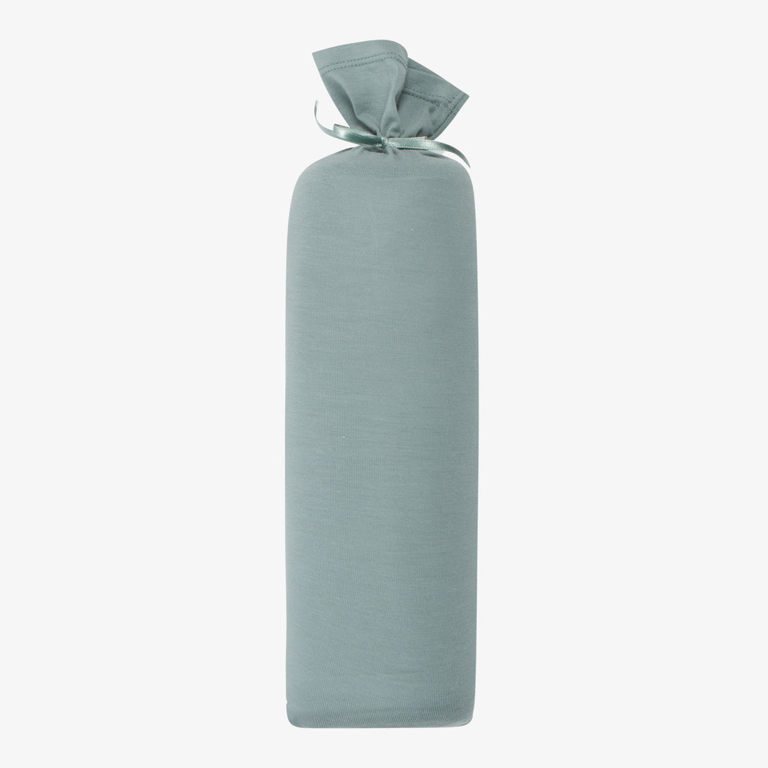 A rolled-up slate blue swaddle blanket with a tie at one end, displayed against a white background.